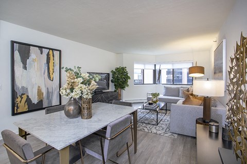 a living room with a table and a couch